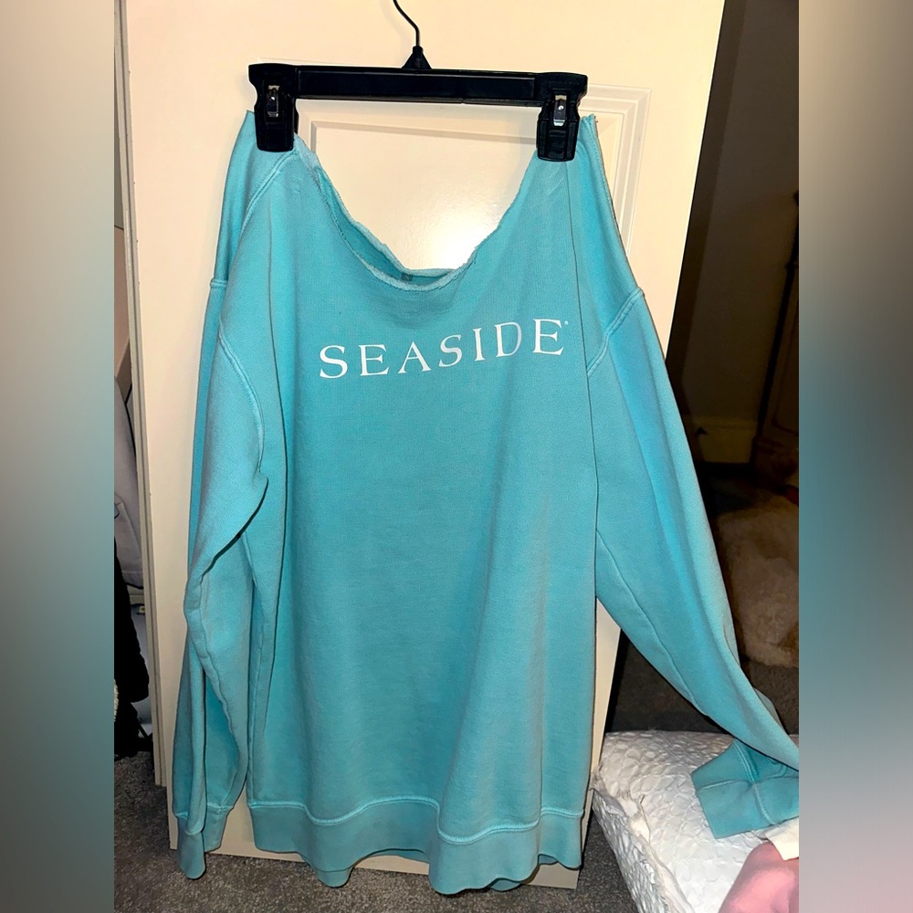 Seaside turquoise blue crew neck sweatshirt; neckline cut off the shoulder